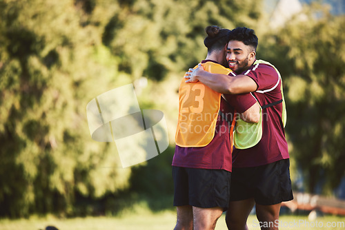 Image of Rugby, teamwork and space with friends hugging for support, motivation or celebration during training. Fitness, sports and success with a man athlete team embracing outdoor at practice for a game