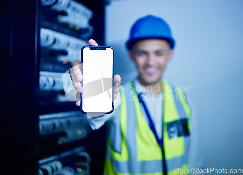 Image of Phone, app and a man IT engineer in a server room for cyber security, maintenance or to install software. Mobile, display and information technology with a technician busy on a network database