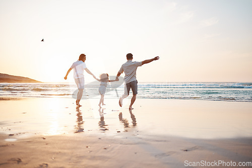 Image of Gay couple on beach, men and child, playing together and holding hands at sunset, running in waves on holiday. Love, happiness and sun, lgbt family on tropical ocean vacation and fun with daughter.