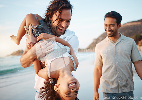 Image of Beach, play and gay parents with girl on holiday, vacation and adventure in summer. Lgbtq family, healthy relationship and happy child with fathers by ocean for bonding, relaxing and fun outdoors