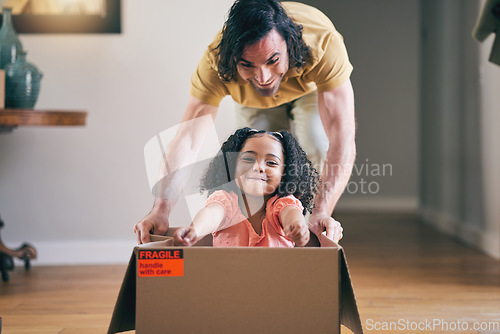 Image of Father, kid and box in new house for games, fun and energy for bonding in real estate apartment. Happy dad, girl child and interracial family play with cardboard boxes for race while moving to home