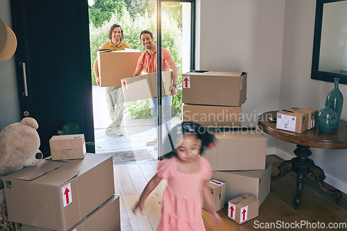 Image of Gay father, moving and girl child running in new home with motion blur, playing or excited to start life at property. LGBTQ men, kid and cardboard package for real estate, adoption and family house