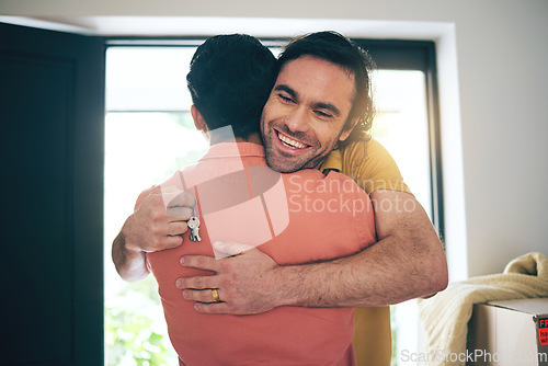 Image of House, keys and gay couple hug in real estate, success or new home celebration together. Property, invest or lgbt men embrace for love, happy or smile for rental, apartment or celebrate mortgage loan