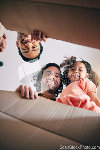 Image of Family, open box and low angle with moving, portrait and smile in new house with gay father, girl or excited. LGBTQ men, cardboard package and happy dad with female child for start, life or property