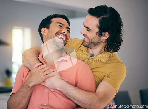 Image of Smile, laughing and gay couple hug, happy and trust in their home with freedom on the weekend together. LGBT, love and man embrace boyfriend in a living room with care, romance and relationship pride