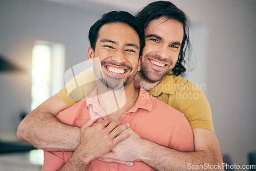 Image of Smile, portrait and gay couple hug, happy and love in their home with freedom on the weekend together. LGBT, face and man embrace boyfriend in a living room with care, romance and relationship pride