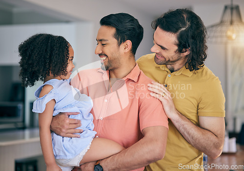 Image of Gay father, girl and hug in house for smile, thinking or together for bonding, care or love. LGBTQ men, parents and happy female child with embrace, diversity and adoption with pride in family home