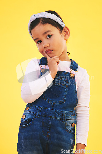 Image of Thinking, portrait and girl child in studio with choice, decision or ask sign on yellow background. Why, face and kid with questions, solution or planning, brainstorming or confused, doubt or idea