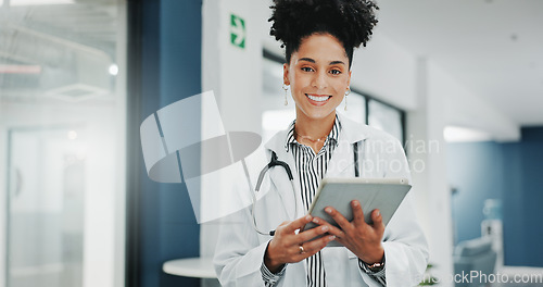 Image of Face of happy woman doctor on tablet for medical research, hospital management and telehealth service. Portrait of young black person in professional healthcare career, job or clinic on digital tech