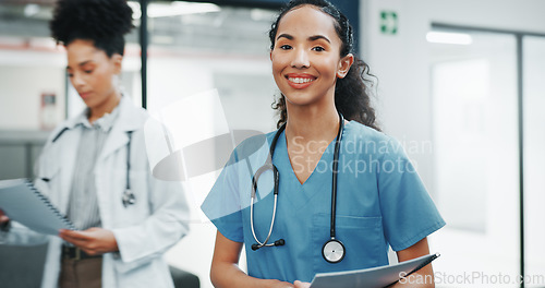 Image of Proud face of woman doctor in busy hospital for healthcare services, leadership and happy career mindset. Confident portrait of young medical professional or female nurse in clinic or health care job