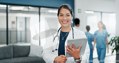 Image of Happy woman or doctor face in busy hospital with tablet for healthcare services, leadership and career mindset. Portrait of medical professional or female on telehealth app for clinic job management