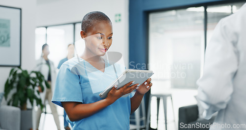Image of Happy woman or black doctor face in busy hospital with tablet for healthcare services, leadership and mindset. Portrait of medical professional or female nurse on telehealth app for clinic management