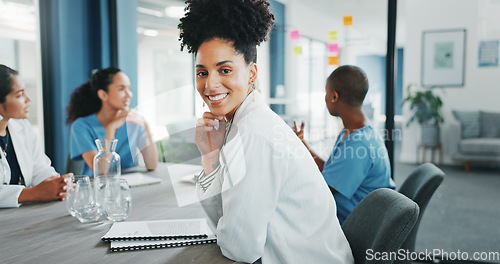 Image of Doctor, face or leadership in hospital meeting, medical planning or life insurance discussion for treatment. Smile, happy or healthcare woman in portrait, teamwork collaboration or clinic diversity