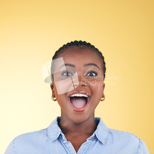 Image of Surprise, wow or face of excited black woman on yellow background with smile for discount deal in studio. Happy, portrait or excited person shocked by sale offer, success or winning lottery jackpot