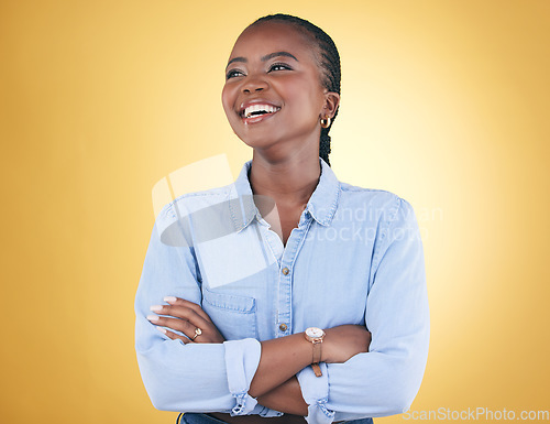 Image of Thinking, idea and happy black woman confident arms crossed isolated in a studio yellow background. African, fashion and relax young person proud of style with a memory of joy, humor and fun