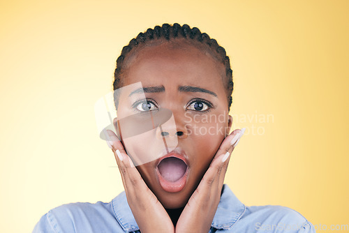 Image of Black woman, face and alarm, shock and emoji with facial expression, drama and surprise isolated on yellow background. Wow, fear and portrait, reaction to announcement or news with anxiety in studio