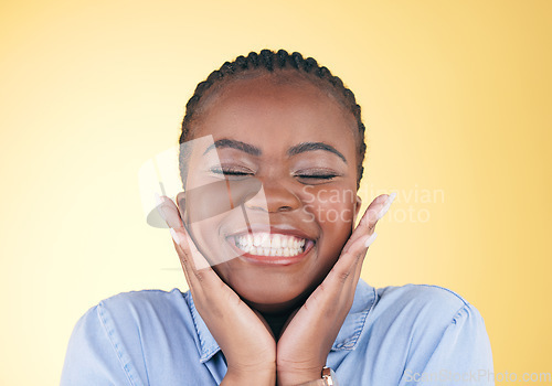 Image of Happy face, hands of black woman and teeth in studio isolated on a yellow background. Smile, touch and dental wellness of natural African model in cosmetic facial treatment, beauty and skincare