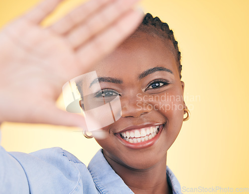 Image of Selfie, happy and smile with portrait of black woman in studio for motivation, social media and influencer. Happiness, freedom and profile picture with face of person on yellow background for post