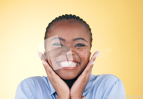 Image of Face smile, hands of black woman and teeth in studio isolated on a yellow background. Happy, portrait and dental wellness of natural African model in cosmetic facial treatment, beauty and skincare