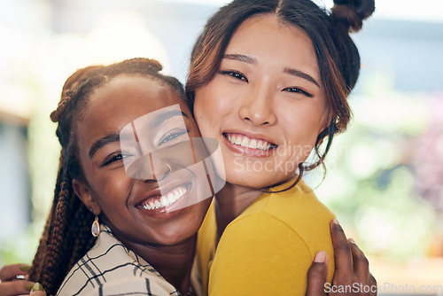 Image of Face, smile and lesbian couple hug in home, bonding and having fun together. Portrait, gay and happy women embrace in love, care or respect, trust or support in commitment, loyalty and interracial