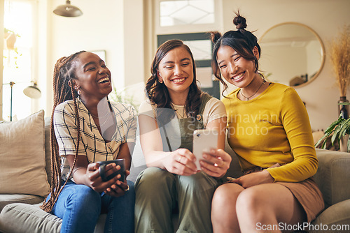 Image of Young women, funny chat and smartphone, friends relax at home with social media and communication. Gen z, happiness and comedy online, meme and using phone with people on couch, mobile app and tech