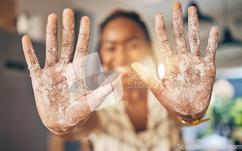 Image of Hands, flour and baking by woman in a kitchen for bread, pizza or handmade food at home. Wheat, palm and female chef with messy fingers from cooking, fun and preparing diy, pasta or cake in her house