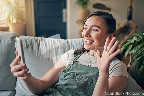 Image of Phone, wave and woman on video call in home, communication and conversation on sofa. Smartphone, hello and happy person in webinar, virtual chat and online meeting, welcome and greeting in house.