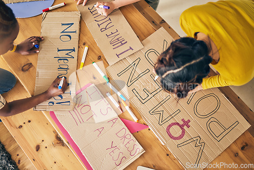 Image of Girl group, sign and writing for protest, top view and support for diversity, power and goals in home. Women friends, cardboard poster and design with billboard for justice, human rights or inclusion