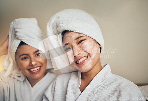 Image of Spa, portrait and women friends with skincare smile for wellness, relax and self care sleepover. Happy, face and people with facial, cream or mask, cosmetics and relax with haircare, beauty or bond