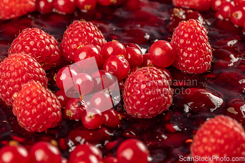 Image of Raspberry jelly lies on cake