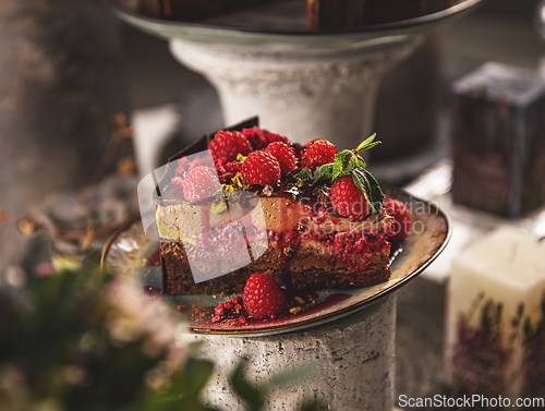 Image of Slice of layered mousse chocolate cake