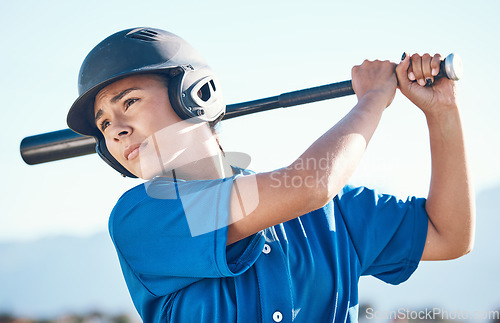 Image of Baseball, bat and swing of a person outdoor on a pitch for sports, performance and competition. Professional athlete or softball woman for swing, commitment and fitness for game, training or exercise