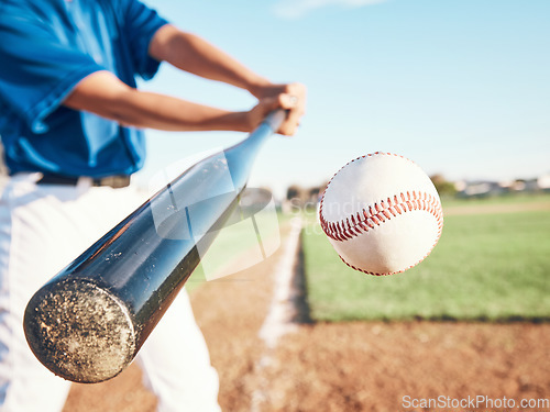 Image of Baseball, hit and person on field for in closeup training, sports and fitness in outdoor competition. Hands, ball and bat softball player with power strike at stadium for action, speed or performance