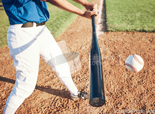 Image of Baseball, bat and person hit a ball outdoor on a pitch for sports, performance and competition. Professional athlete or softball player for a game, training or exercise challenge at field or stadium