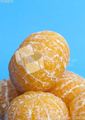 Image of peeled delicious tangerine