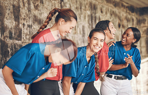 Image of Sports team, people or friends laughing together with for fitness, competition or game. Diversity, happy and group of women in a dugout for baseball, training or communication or funny conversation