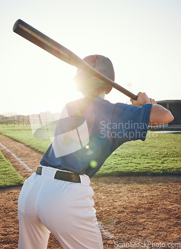 Image of Baseball, bat and a person outdoor on a pitch for sports, performance and competition. Behind professional athlete or softball player for game training at a field or stadium in summer with lens flare