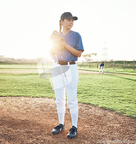 Image of Baseball, pitcher and sports person outdoor on a pitch for performance and competition. Professional athlete or softball woman thinking of a game, training or exercise challenge at field or stadium