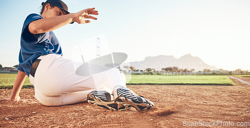 Image of Slide, baseball action and player in dirt for game or sports competition on a pitch in a stadium. Man, ground and tournament performance by athlete or base runner in training, exercise or workout