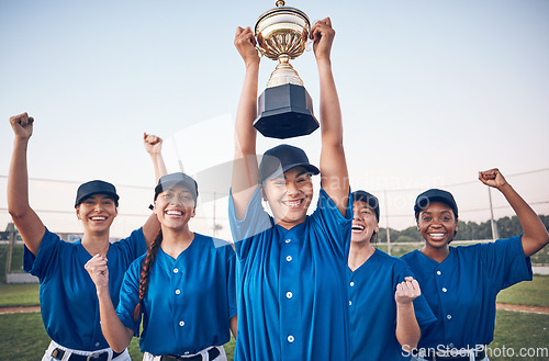 Image of Trophy, baseball and winning team portrait with women outdoor on a pitch for sports competition. Professional athlete or softball player group celebrate champion prize, win or achievement at a game