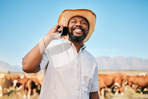 Image of Happy black man, phone call and animals for communication, farming or networking in the countryside. African male person smile and talking on mobile smartphone for conversation or discussion on farm