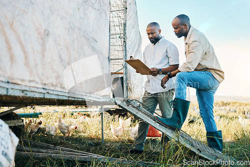 Image of Farmer, clipboard and agriculture team planning or check harvest together to monitor Sustainability produce in a farm. Teamwork, growth and people in collaboration for organic crop information