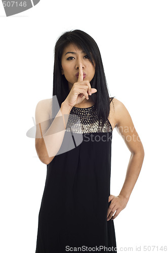 Image of asian with finger on her lips