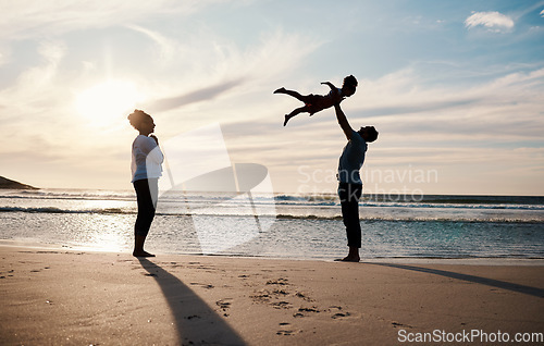 Image of Family, beach and child in air with parents, sunshine with happiness and together with bonding on vacation. Travel, adventure and mother, father and kid flying, happy people in nature with silhouette