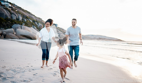 Image of Family, running and happiness on beach, travel with mother, father and kid outdoor, fun together with games and bonding. Travel, adventure and playful, parents and child with happy people and energy
