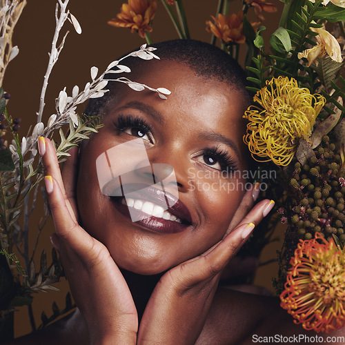 Image of African woman, plants and thinking for aesthetic in studio with flowers for beauty, wellness and glow by brown background. Girl, model and smile on face for idea, leaves or memory with skin cosmetics