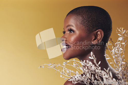 Image of Thinking, flowers and black woman with skincare, smile and cosmetics on a brown studio background. Ideas, person and model with natural beauty, mockup space and dermatology with shine and wellness