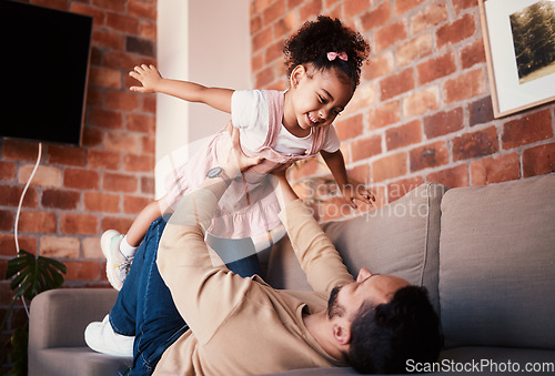 Image of Couch, airplane and father playing child or daughter enjoy game as bonding for care together in a home or house. Fly, love and parent with kid in living room, happy and smile on weekend for happiness