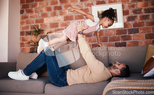 Image of Sofa, airplane and dad playing child or daughter enjoy game as bonding for care together in a home or house. Fly, love and father with kid in living room, happy and smile on weekend for happiness