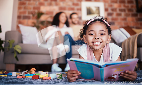 Image of Home, portrait and girl on the floor, reading book and happiness with knowledge, relax and weekend break. Face, kid and female child in a lounge, parents and story with fun, playful and learning